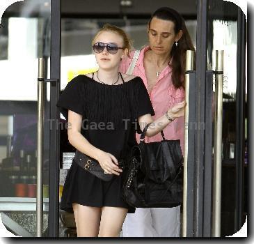 Dakota Fanning  shopping with her mother at Barney's New York.