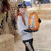 Phoebe Price 
with her mother Flora and dog Henry visits Mr. Bones Pumpkin Patch.