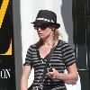 **Exclusive**Amy Smart listening to her iPod as she leaves the Apple store in Hollywood Los Angeles.