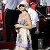 Ashley Judd watches her husband compete in the Firestone Indy 300 at the Homestead Miami Speedway Homestead.