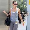 Ashley Tisdale leaving her gym in West Hollywood while wearing red sunglasses Los Angeles.