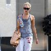 Ashley Tisdale arrives to a West Hollywood gym Los Angeles.