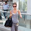 Ashley Tisdale leaving her gym in West Hollywood while wearing red sunglasses Los Angeles.