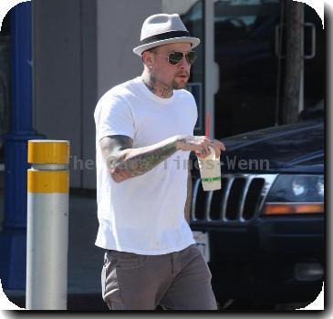 ***Exclusive***Benji Madden picks up a drink from a restaurant in West Hollywood. Los Angeles.