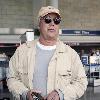 Chevy Chase arriving at LAX airport to catch a flight to New York..