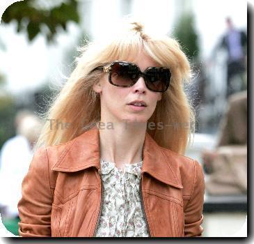 Claudia Schiffer heads home after dropping her kids off at school London.