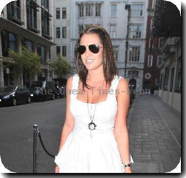 Danielle Lloyd dressed in a white summer dress leaves her hotel and drives off in her custom Range Rover
London, England - 29.09.09
**Not Available for use in the Evening Standard, London Lite, or London Paper. Available for the rest of the world***
Credit Mandatory: IANS-WENN