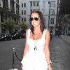 Danielle Lloyd dressed in a white summer dress leaves her hotel and drives off in her custom Range Rover
London, England - 29.09.09
**Not Available for use in the Evening Standard, London Lite, or London Paper. Available for the rest of the world***
Credit Mandatory: IANS-WENN