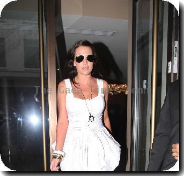 Danielle Lloyd dressed in a white summer dress leaves her hotel and drives off in her custom Range Rover
London, England - 29.09.09
**Not Available for use in the Evening Standard, London Lite, or London Paper. Available for the rest of the world***
Credit Mandatory: IANS-WENN