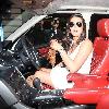 Danielle Lloyd dressed in a white summer dress leaves her hotel and drives off in her custom Range Rover
London, England - 29.09.09
**Not Available for use in the Evening Standard, London Lite, or London Paper. Available for the rest of the world***
Credit Mandatory: IANS-WENN