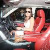 Danielle Lloyd dressed in a white summer dress leaves her hotel and drives off in her custom Range Rover
London, England - 29.09.09
**Not Available for use in the Evening Standard, London Lite, or London Paper. Available for the rest of the world***
Credit Mandatory: IANS-WENN