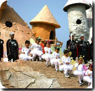 Mini-Land
Little performers entertain visitors to Dwarf Kingdom, a Chinese theme park and tourist attraction in Kunming, China.
Actors dress up to recreate wedding scenes, song and dance routines, and action adventures.
All the little residents of Dwarf Kingdom live inside the village, in houses shaped like trees or mushrooms.
Residents must be under 4 feet 3 inches tall, and they even run their own police and fire services - all funded by the fees paid by curious visitors.
**Not Available for Publication in China. Available for publication in the Rest of the World**
Credit IANS-WENN Mini-Land
Little performers entertain visitors to Dwarf Kingdom, a Chinese theme park and tourist attraction in Kunming, China.
Actors dress up to recreate wedding scenes, song and dance routines, and action adventures.
All the little residents of Dwarf Kingdom live inside the village, in houses shaped like trees or mushrooms.
Residents must be under 4 feet 3 inches tall, and they even run their own police and fire services - all funded by the fees paid by curious visitors.
**Not Available for Publication in China. Available for publication in the Rest of the World**
Credit IANS-WENN