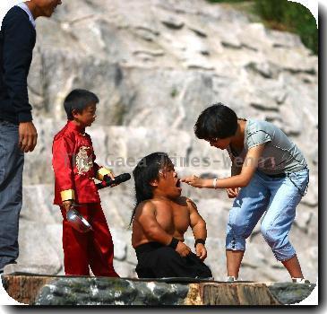 Mini-Land
Little performers entertain visitors to Dwarf Kingdom, a Chinese theme park and tourist attraction in Kunming, China.
Actors dress up to recreate wedding scenes, song and dance routines, and action adventures.
All the little residents of Dwarf Kingdom live inside the village, in houses shaped like trees or mushrooms.
Residents must be under 4 feet 3 inches tall, and they even run their own police and fire services - all funded by the fees paid by curious visitors.
**Not Available for Publication in China. Available for publication in the Rest of the World**
Credit IANS-WENN Mini-Land
Little performers entertain visitors to Dwarf Kingdom, a Chinese theme park and tourist attraction in Kunming, China.
Actors dress up to recreate wedding scenes, song and dance routines, and action adventures.
All the little residents of Dwarf Kingdom live inside the village, in houses shaped like trees or mushrooms.
Residents must be under 4 feet 3 inches tall, and they even run their own police and fire services - all funded by the fees paid by curious visitors.
**Not Available for Publication in China. Available for publication in the Rest of the World**
Credit IANS-WENN