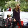 Elle Macpherson
taking her son to school.