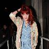 Florence Welch of Florence And The Machine 
arriving at BBC Radio One studios wearing a blue peacock printed dress.