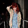 Florence Welch of Florence And The Machine 
arriving at BBC Radio One studios wearing a blue peacock printed dress.