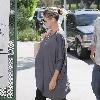 A very pregnant Heidi Klum takes her three children to martial arts school in Koreatown Los Angeles.