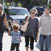 A very pregnant Heidi Klum takes her three children to martial arts school in Koreatown Los Angeles.