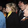 U.S. Secretary of State Hillary Clinton walks along Grafton Street with the Pittsburgh Steelers owner and the new U.S. ambassador to Ireland, Dan Rooney. They stopped at Bewleys Coffee Shop before heading into McDaid's Pub for a drink..