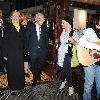 U.S. Secretary of State Hillary Clinton walks along Grafton Street with the Pittsburgh Steelers owner and the new U.S. ambassador to Ireland, Dan Rooney. They stopped at Bewleys Coffee Shop before heading into McDaid's Pub for a drink..