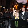 U.S. Secretary of State Hillary Clinton walks along Grafton Street with the Pittsburgh Steelers owner and the new U.S. ambassador to Ireland, Dan Rooney. They stopped at Bewleys Coffee Shop before heading into McDaid's Pub for a drink..