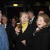 U.S. Secretary of State Hillary Clinton walks along Grafton Street with the Pittsburgh Steelers owner and the new U.S. ambassador to Ireland, Dan Rooney. They stopped at Bewleys Coffee Shop before heading into McDaid's Pub for a drink..