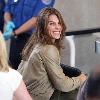 Fitness guru Jillian Michaels passes through airport security checkpoint to catch a flight.