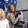 Fitness guru Jillian Michaels passes through airport security checkpoint to catch a flight.