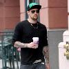 Joel Madden carrying a coffee while out and about in Beverly Hills Los Angeles.