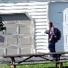 Jon Gosselin arrives at his former home with the birthday cake for his twin daughters, Cara and MadyWaterville.