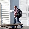 Jon Gosselin arrives at his former home with the birthday cake for his twin daughters, Cara and MadyWaterville.