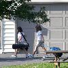 Jon Gosselin arrives at his former home with the birthday cake for his twin daughters, Cara and MadyWaterville.