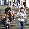 Katie Price, aka Jordan, with boyfriend Alex Reid and her son Junior,goes shopping in Brighton. Katie was heard to tell photographers that she would marry Alex. Sussex.