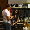 Katie Price, aka Jordan, with boyfriend Alex Reid and her son Junior,goes shopping in Brighton. Katie was heard to tell photographers that she would marry Alex. Sussex.