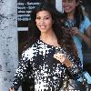 Kourtney Kardashian shows off her baby bump as she leaves a hair salon in West Hollywood Los Angeles.