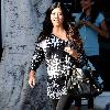 Kourtney Kardashian shows off her baby bump as she leaves a hair salon in West Hollywood Los Angeles.