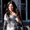 Kourtney Kardashian shows off her baby bump as she leaves a hair salon in West Hollywood Los Angeles.