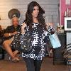 Kourtney Kardashian shows off her baby bump as she leaves a hair salon in West Hollywood Los Angeles.