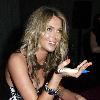 Jennifer Hawkins signs autographs during a Lovable Live Fashion Shoot at Luxe Studios Sydney.