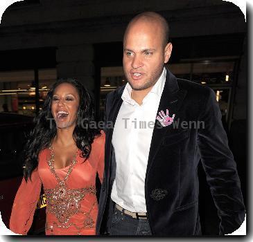 Melanie Brown and her husband Stephen Belafonte arriving back at their hotel. Upon arrival Belafonte boasted to snappers about the size of his manhood, which had Mel in fits of laughter! London.