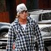 **Exclusive**
Mickey Rourke smoking a cigarette and carrying a bottled water while out about at Manhattan's West Village.