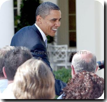 President Barack Obama 
speaks with doctors from all over the country who are joining him in pushing for health insurance reform in the Rose Garden of the White House.