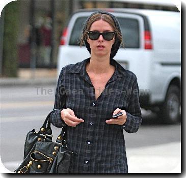 Nicky Hilton
is followed by a man in a wolf costume while out and about in West Hollywood.