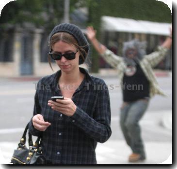 Nicky Hilton
is followed by a man in a wolf costume while out and about in West Hollywood.