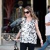 Rebecca Gayheart
wearing flip flops and a loose top out and about lunching with a friend.