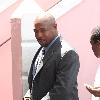 Former Bahamas Senator Pleasant Bridgewater leaves court on the first day of the trial against her and paramedic Tarino Lightbourne for trying to extort at least $25 million from movie star John Travolta, Nassau.