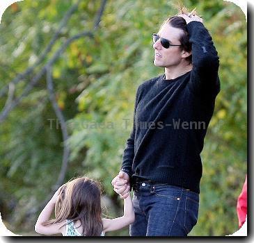 Tom Cruise plays with his daughter Suri at a park in Cambridge.
Boston, Massachusetts - 10.010.09
Mandatory Credit: IANS-WENN