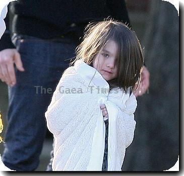 Tom Cruise plays with his daughter Suri at a park in Cambridge.
Boston, Massachusetts - 10.010.09
Mandatory Credit: IANS-WENN