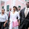 Paramedic Tarino Lightbourne 
outside court for the trial against him for trying to extort at least Nassau5 million from movie star John Travolta..