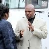 Paramedic Tarino Lightbourne 
outside court for the trial against him for trying to extort at least Nassau5 million from movie star John Travolta..